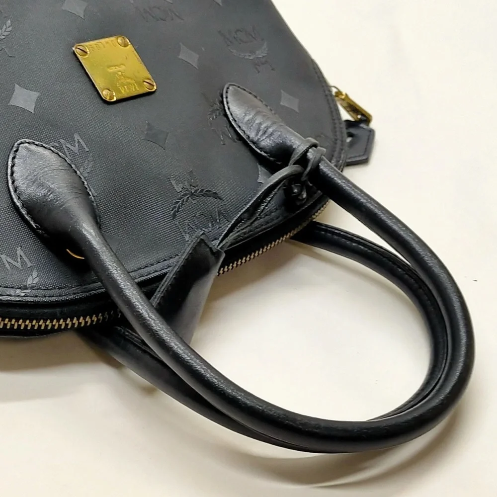 MCM Black Satchel with Gold Accents lock and key included authentic